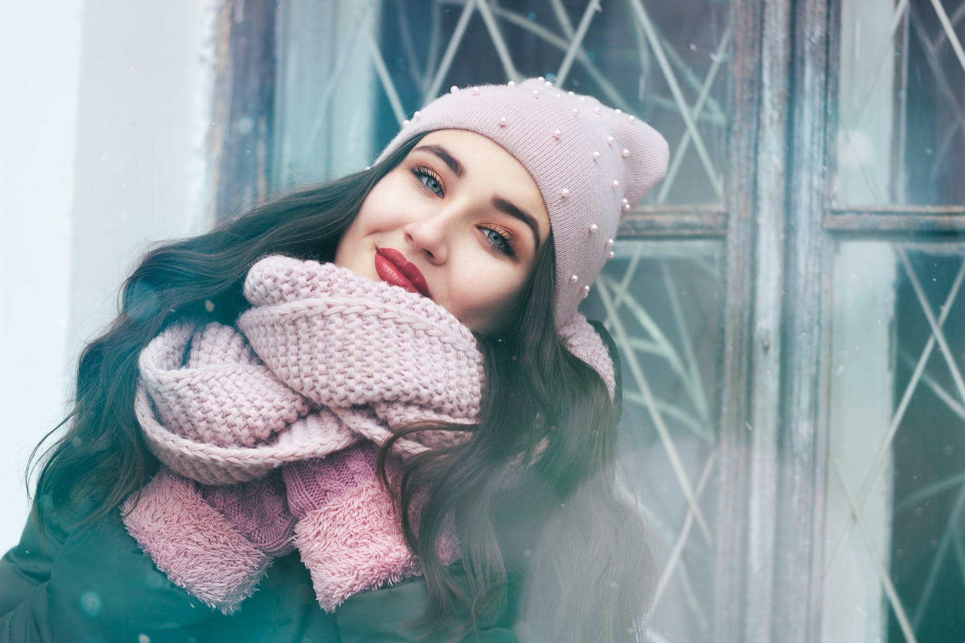 woman wearing pink scarf