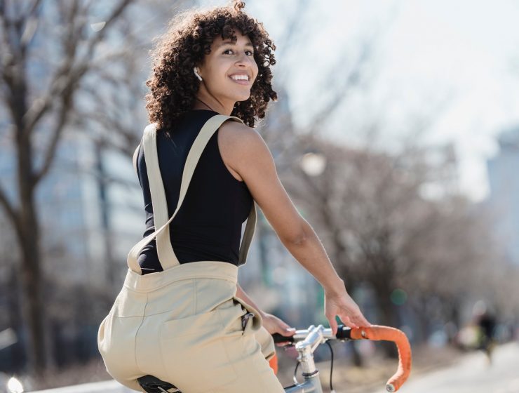 a woman riding a road bike