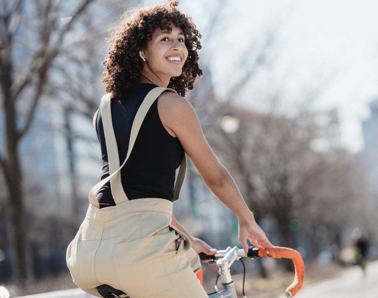 a woman riding a road bike