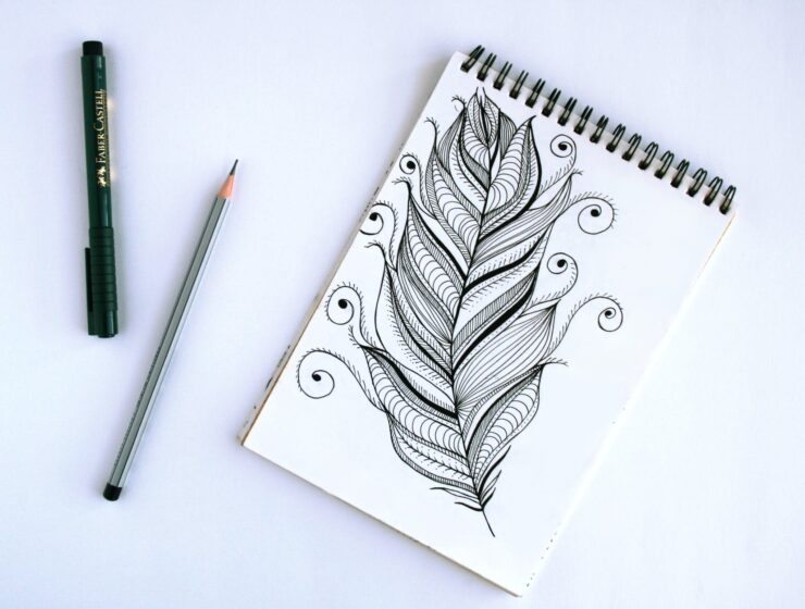 črčkarije i škrabotine, spring book with feather sketch