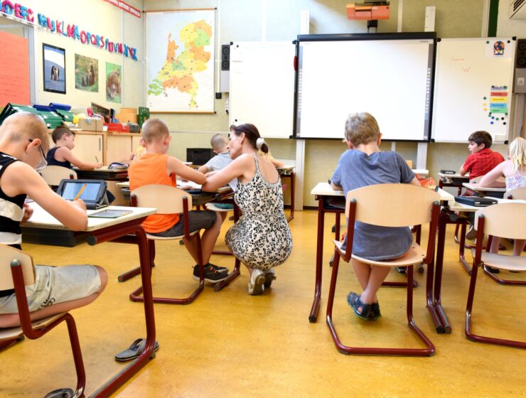 Djeca su samo preslika, children sitting on brown chairs inside the classroom