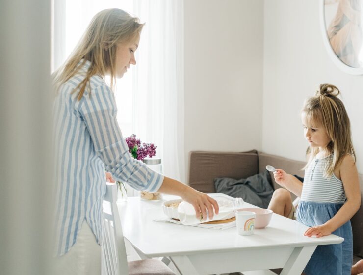 dom, mother pouring milk on a cup