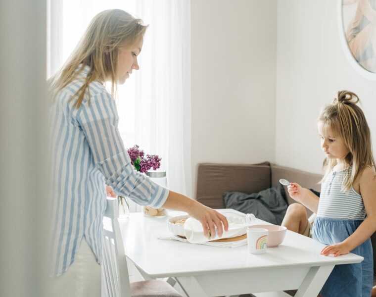 dom, mother pouring milk on a cup